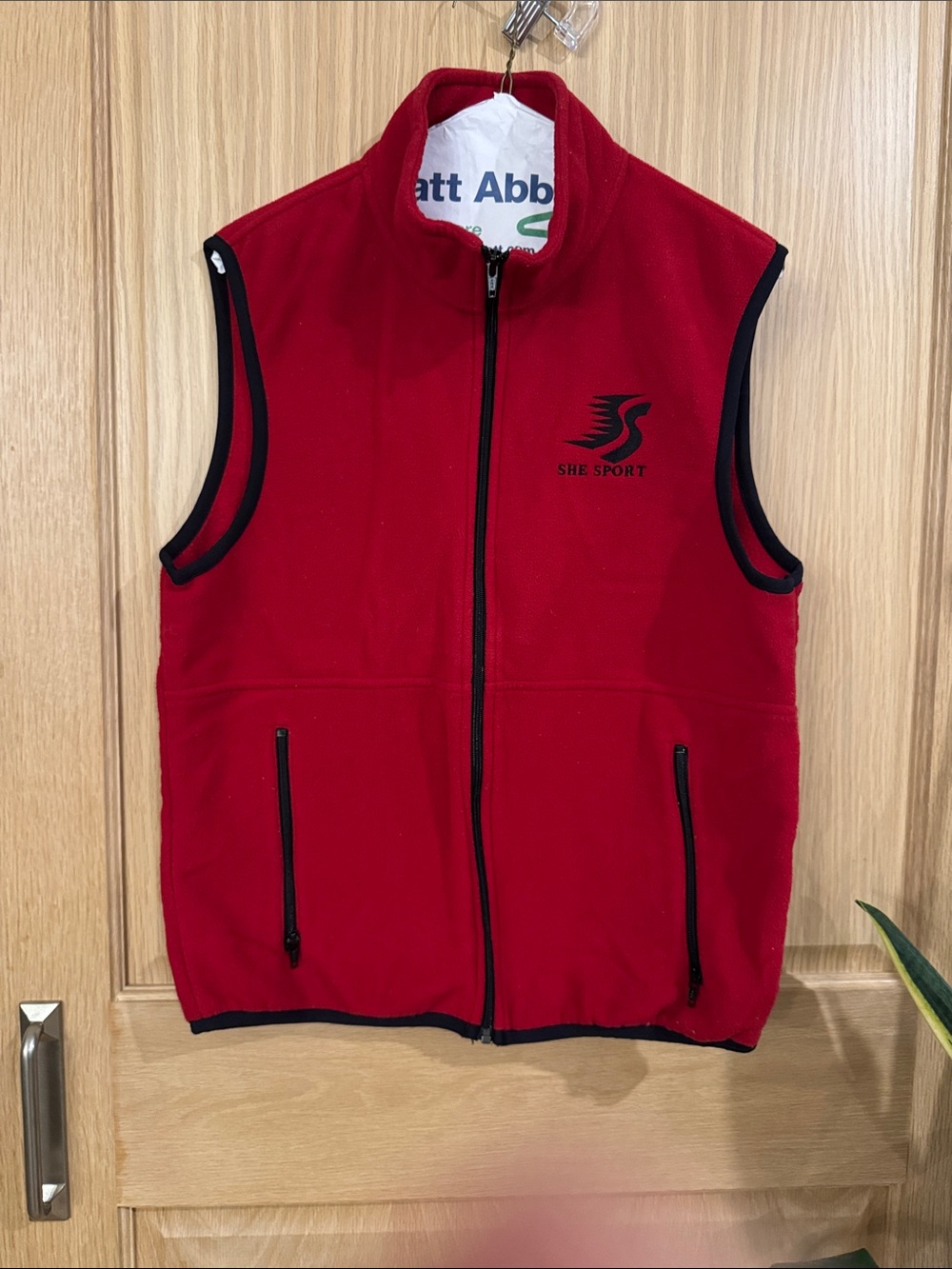 Port and Company Red Fleece Vest with Black Trim and Zippered Pockets